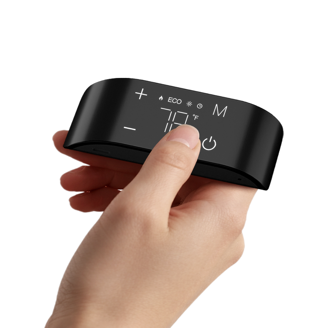 Hand holding the CozyPod rechargeable remote